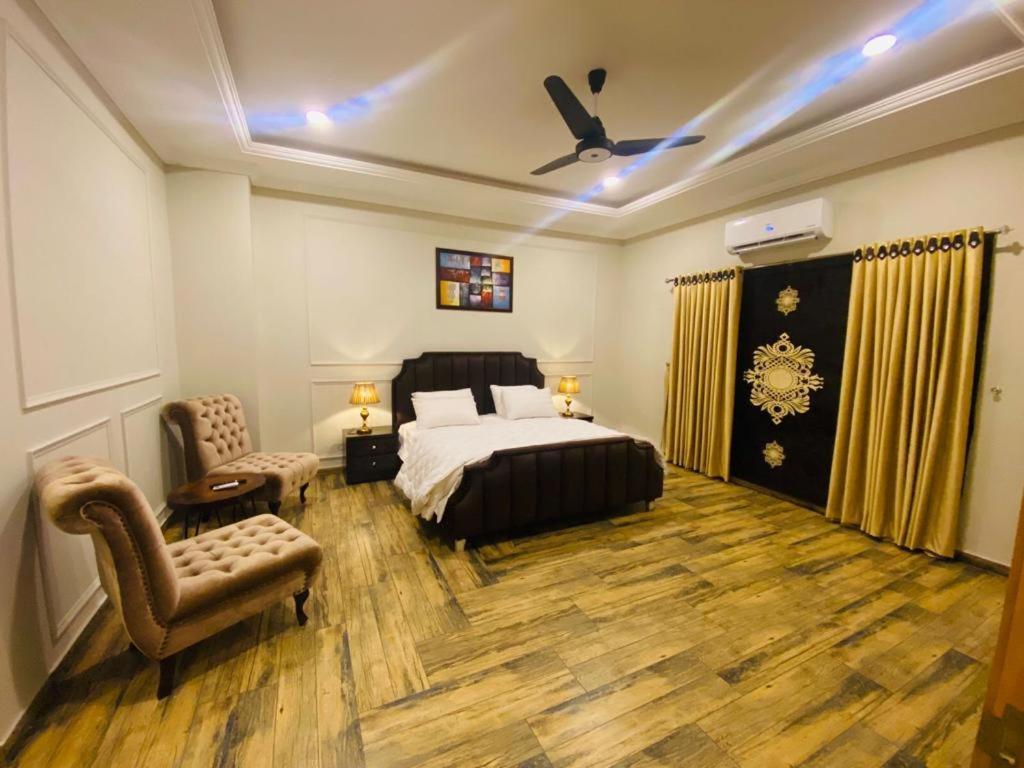 Holidazzle Serviced Apartments Bahria Town Rawalpindi Bagian luar foto