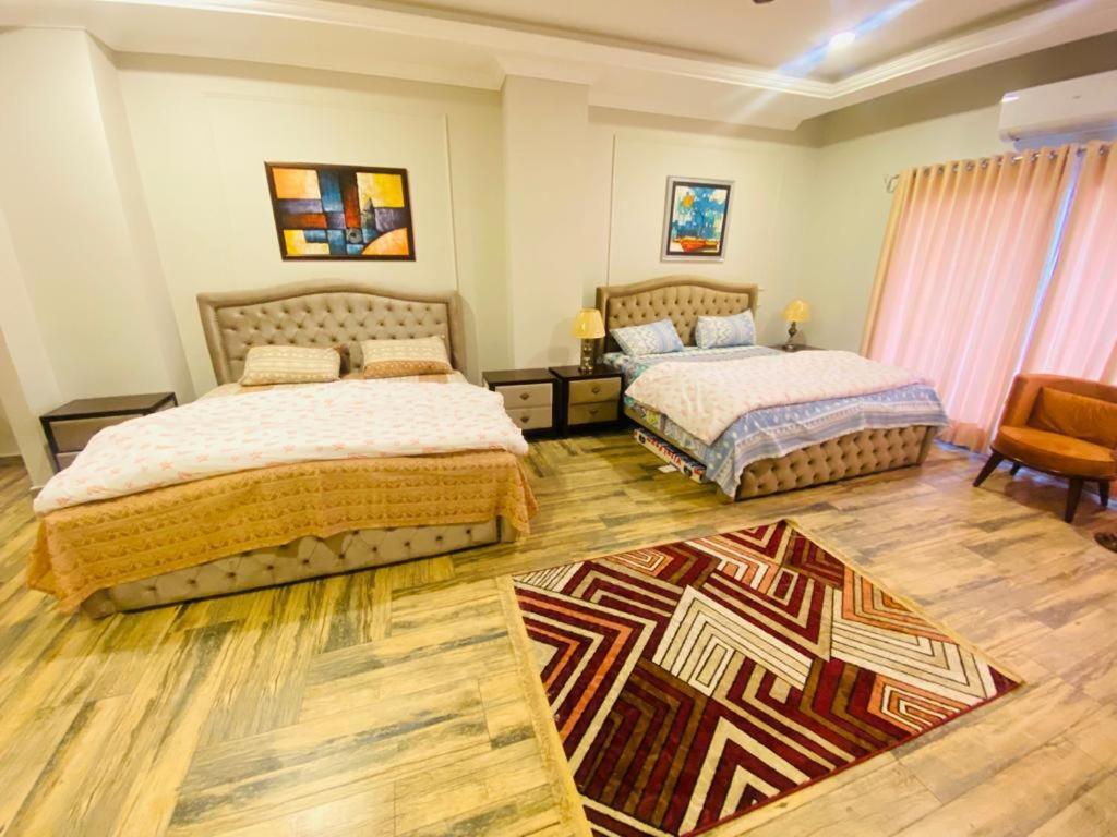 Holidazzle Serviced Apartments Bahria Town Rawalpindi Bagian luar foto