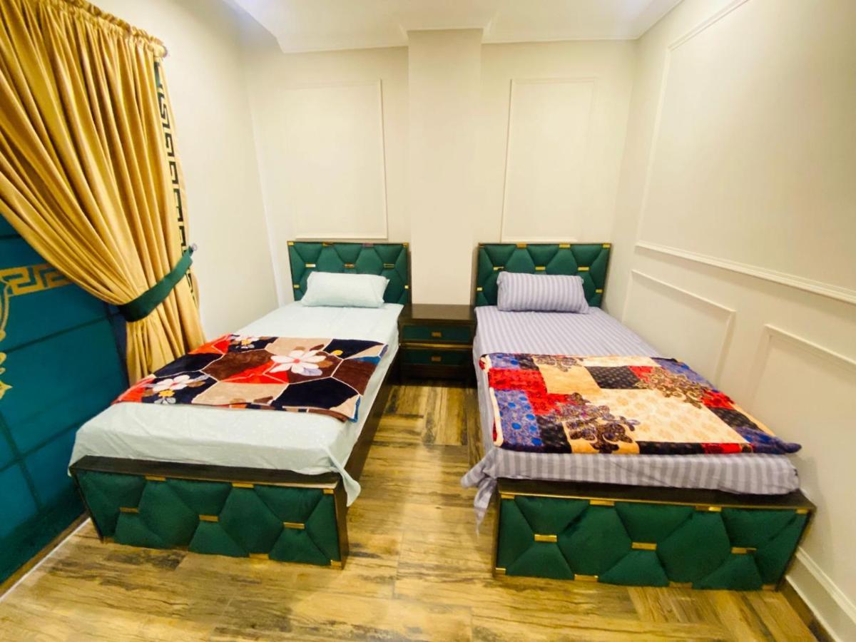 Holidazzle Serviced Apartments Bahria Town Rawalpindi Bagian luar foto