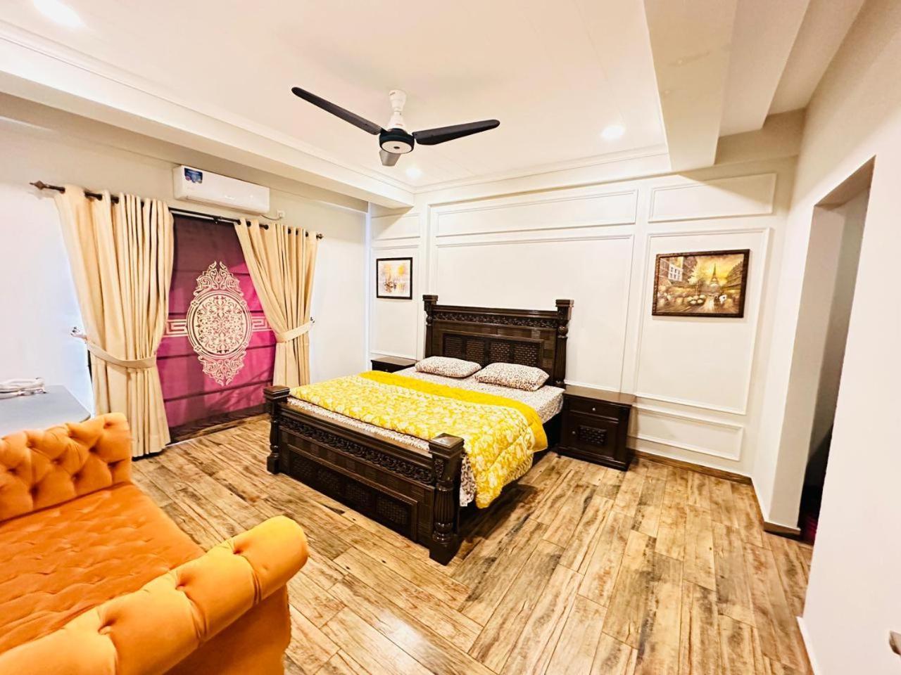 Holidazzle Serviced Apartments Bahria Town Rawalpindi Ruang foto